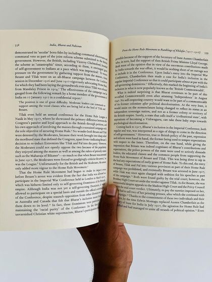 An open copy of 'India, Bharat and Pakistan'. The text provides a detailed, evidence-based analysis of the historical events and ideological currents that have shaped the subcontinent.
