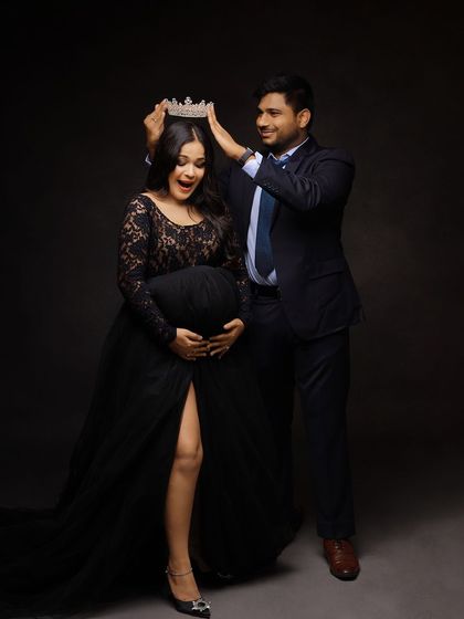 A fun and loving moment as the husband-to-be playfully crowns his queen. This shot captures the joy and adoration in their relationship.