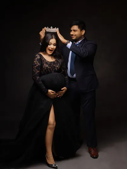 A fun and loving moment as the husband-to-be playfully crowns his queen. This shot captures the joy and adoration in their relationship.