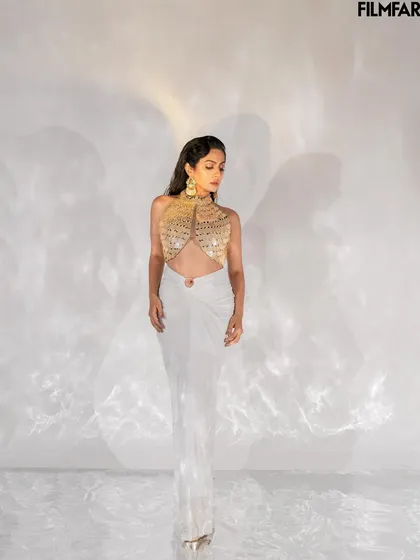 This full-length shot for Filmfare showcases the entire ensemble against a clean, high-key background. The lighting setup was designed to create interesting shadow play while keeping the focus on the subject.