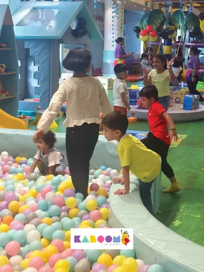 A wide view of the fun happening in and around our ball pit. There's always something exciting going on at Kaboom.