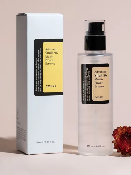 A classic, clean e-commerce shot for COSRX. This minimalist style, with soft lighting and simple propping, puts the focus entirely on the product and its packaging, meeting the standards for marketplace listings and brand websites.