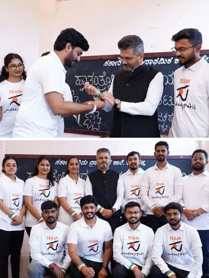 My team members tying friendship bands for Raksha Bandhan, which coincided with our Independence Day event. This gesture symbolizes our promise to protect and support the community.