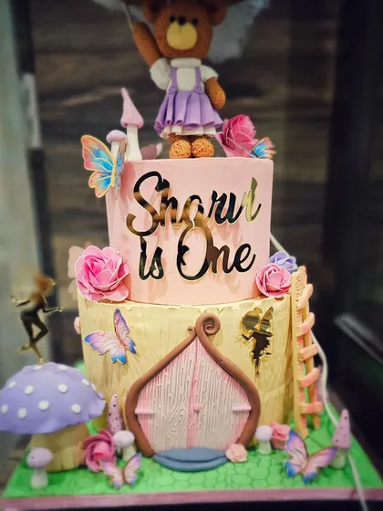 A view of the lower tiers of the fairy house cake.
