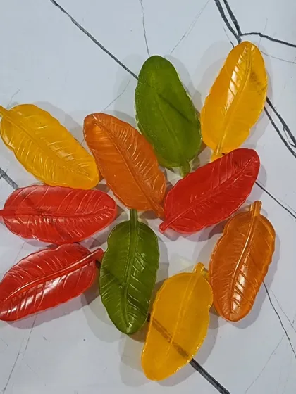 A collection of my colorful leaf-shaped soaps, freshly made to order. These are great for adding a touch of nature to your gifting.