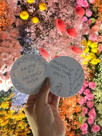We love creating custom details that tie into the event's story. These personalized coasters with a clever play on the couple's names were a fun and memorable element of their cocktail party.