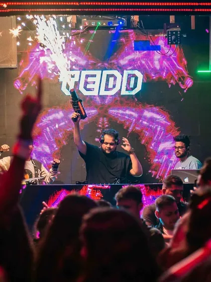 Lighting it up with a pyro gun. I use every tool at my disposal to make sure the energy in the club is always at its maximum.