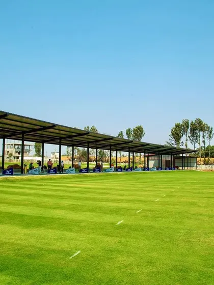 Our covered driving range allows for uninterrupted practice, rain or shine. With numerous bays available, you can focus on your long game and see the full flight of your ball across the lush green fairway.