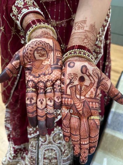 The beautiful dark stain of a Karwa Chauth design. This shows how my natural henna develops into a rich, deep color, making the intricate figures stand out.