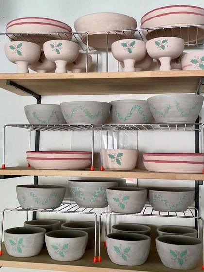 The Christmas collection in progress. Here are the pieces on the studio shelves after being painted, waiting to be glazed and fired.