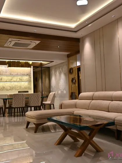 I believe in creating spaces that feel both grand and welcoming. This living and dining room project in Thane features custom furniture, layered lighting with a false ceiling, and a cohesive color palette to connect the two zones.