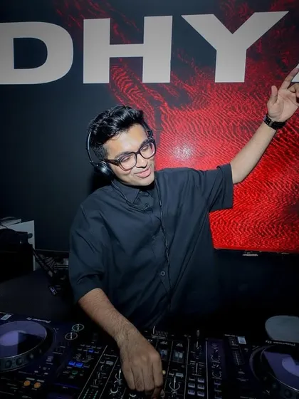 A shot of me in my element at Shiloh, Mumbai. The custom visuals and the energy of a Sunday night crowd make for an unforgettable gig.