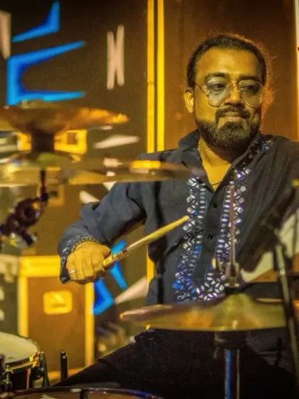 Our drummer smiling as he keeps the beat, enjoying the fantastic atmosphere at the JW Marriott.