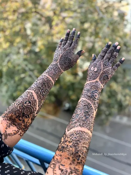 A full view of Nabeela's arms, showcasing the beautiful and unconventional design structure.