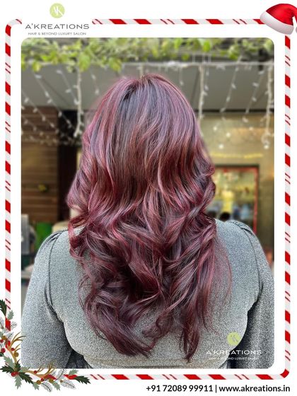 This fiery red color commands attention. It's a powerful and confident look, styled with voluminous waves to showcase its richness and shine.