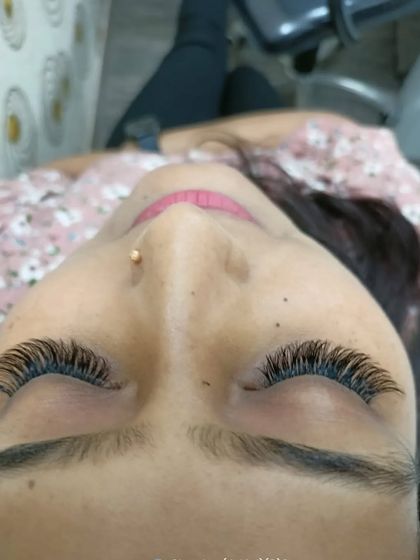 This client's finished volume lashes look full and luxurious. This style eliminates the need for mascara and gives you a ready-to-go look every morning.