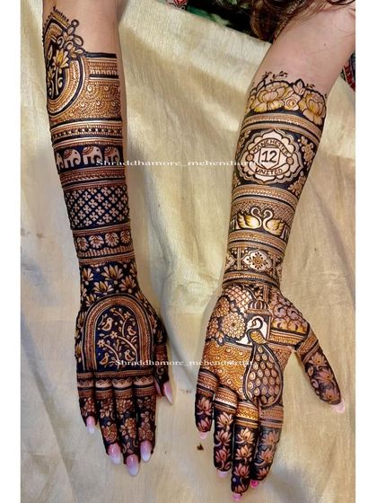 A unique design created based on the bride's request. It features a tree of life with birds, a special date, and a mix of floral and geometric bands for a truly custom look.