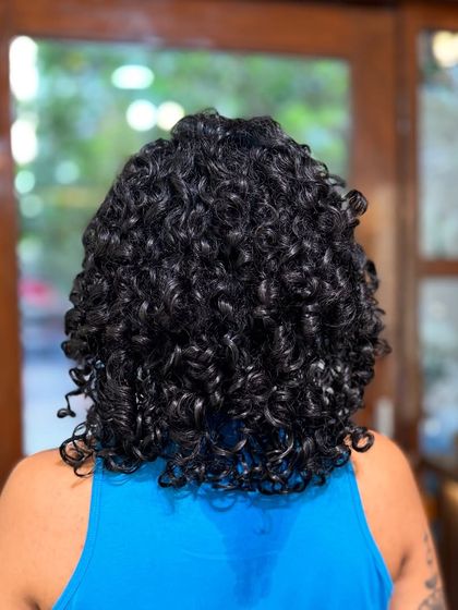 More examples of my short curly haircuts, from bobs to layered chops, each one personalized to the client's curl pattern and face shape.