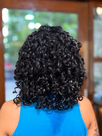 More examples of my short curly haircuts, from bobs to layered chops, each one personalized to the client's curl pattern and face shape.