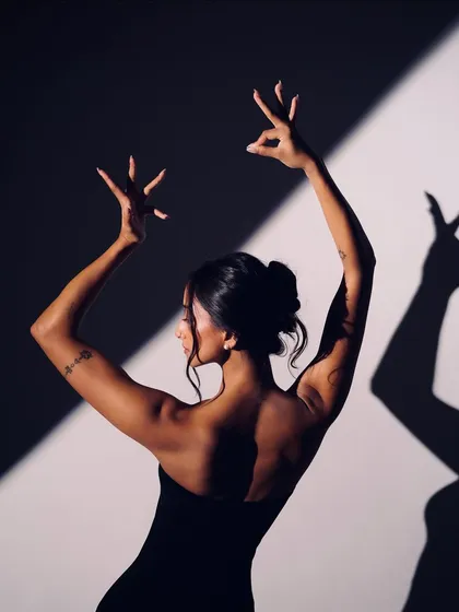 A study of form and shadow, with my back to the camera. These conceptual photoshoots allow me to explore dance as a purely visual and sculptural art form.