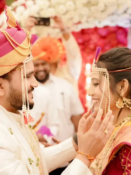 A sweet, gentle moment between the bride and groom. Her soft, natural makeup is perfect for these intimate, candid shots.