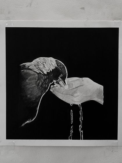 "Caring." This drawing of a bird drinking from a hand is about nurturing and kindness. The water trickling down was a fun detail to draw.