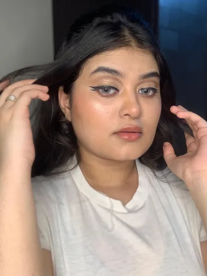 Another shot of the classic, clean makeup look.