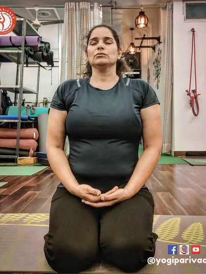 "Through meditation, we can train our minds." A student sits in Vajrasana, embodying the calm and focus cultivated through Dhyana.