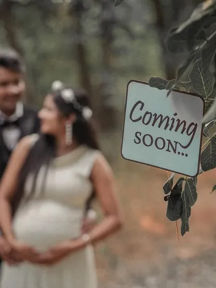 Sometimes, the smallest details tell the biggest story. I use props like this "Coming Soon" sign and tiny baby booties to create sweet, personalized pregnancy announcement photos that you can share with your loved ones.