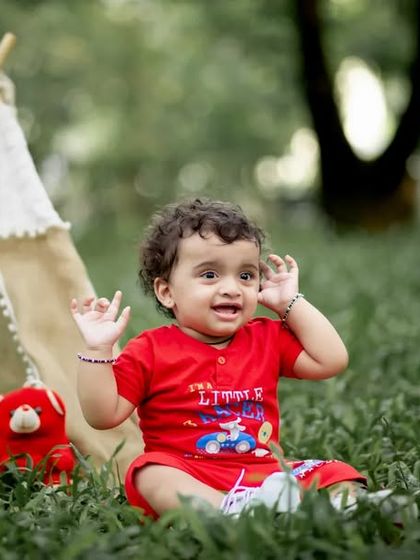 Tiny hands, big adventures. Celebrating one year with a fun camp-themed outdoor shoot.