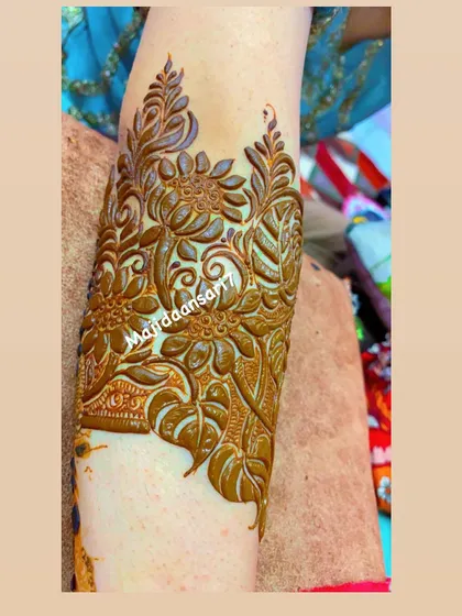 A beautiful floral armband design with intricate details.