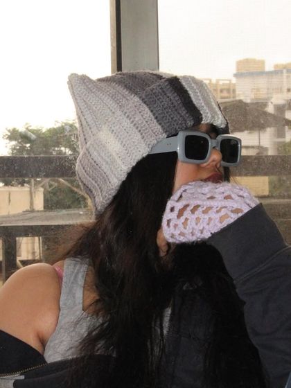 A side view of the cat ear beanie. The shape is subtle but adds a playful touch to your look. I can make these in any color combination you like.