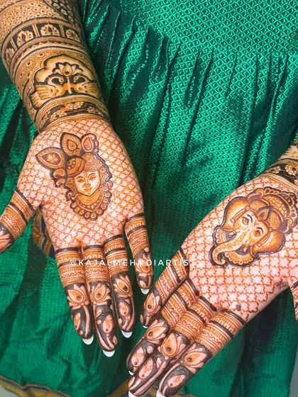 A prayer on your palms. This bridal henna was blessed with the divine presence of Shreenathji and Ganpati Bappa, set against a delicate net pattern for a truly graceful design.