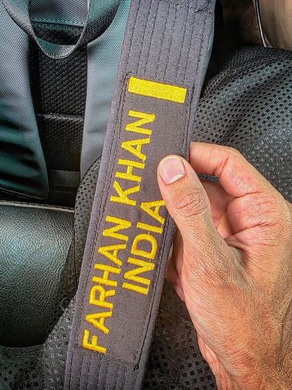 A close-up of my personalized black belt. It represents years of hard work, dedication, and what it takes to reach this level.