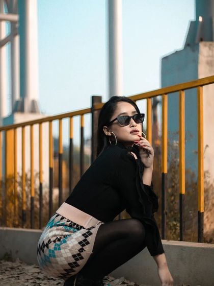 A low-angle shot that adds a dynamic feel to this stylish winter fashion look.