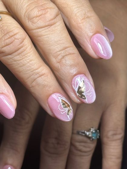 Another view of the beautiful pink and gold butterfly nails.
