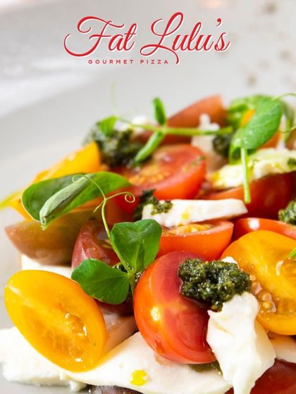 A classic Caprese salad, done my way. I use the freshest cherry tomatoes, creamy mozzarella, and a drizzle of pesto for a simple yet elegant starter.