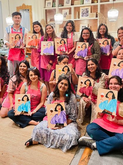 A full group shot from a popular wine and paint workshop. The energy in these sessions is always fantastic.