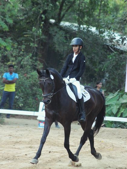 A young rider from my team competing in dressage at the Auroville Horse Show. I believe in giving riders of all ages the opportunity to compete and develop their skills.