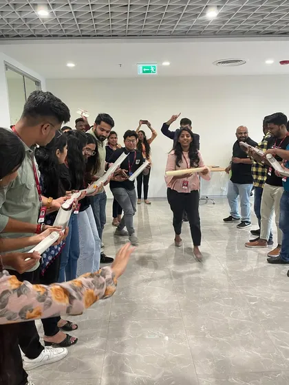 The start of a team building game. You can feel the anticipation as the two teams get ready to compete in this coordination challenge.