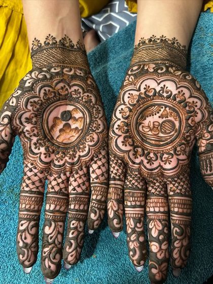 A Karwachauth special design with traditional motifs. One hand shows a woman with the sieve and moon, while the other has a pot (kalash) and diya.