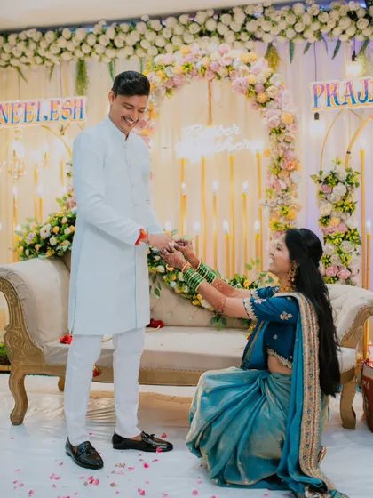 A playful and happy moment during the engagement ceremony.