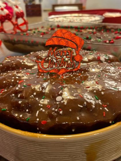 For a little twist on the classic Christmas cake, I added a layer of my homemade caramel sauce on top of this rum cake. It adds a wonderful sweetness and gooey texture.