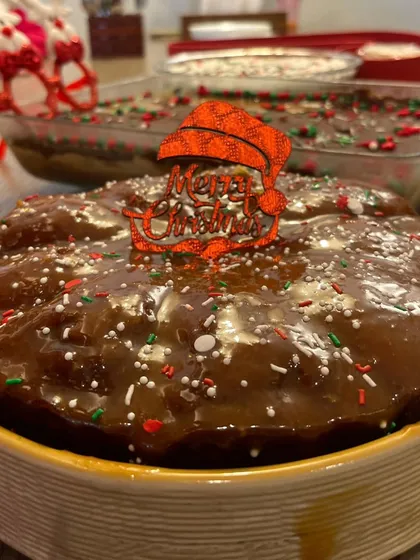 For a little twist on the classic Christmas cake, I added a layer of my homemade caramel sauce on top of this rum cake. It adds a wonderful sweetness and gooey texture.