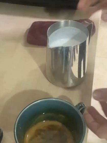 A close-up of a latte being poured. This is a key skill we teach in our "Go Abroad" course to help students find part-time work.