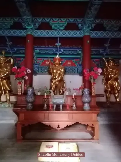 An altar with guardian deities inside the Shaolin Monastery. These figures are protectors of the temple and its teachings.