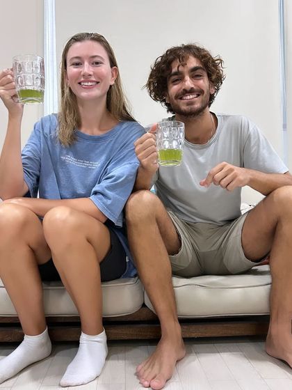 Cheers to relaxation. A happy couple enjoys a refreshing post-float drink, feeling reconnected and rejuvenated.