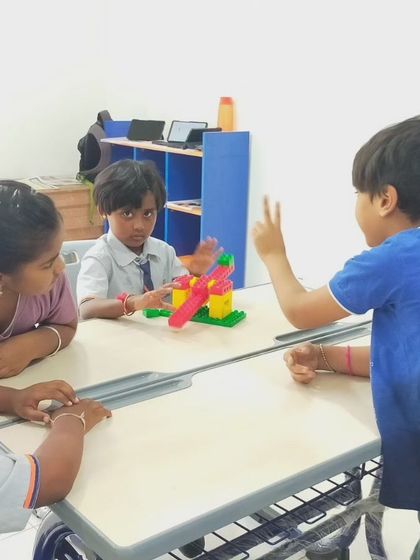 A group of students at TSGM discusses their project. Our classes foster an environment of open communication and collaborative problem-solving.