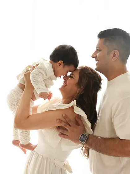 A nose-to-nose moment of love. This close-up shot is incredibly intimate and sweet, capturing the special bond between mother and child. These are the fleeting moments I love to freeze in time.