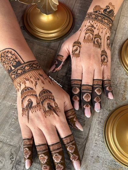 This unique design features birds in ornate cages, a modern take on traditional motifs, combined with architectural elements for a storybook feel.